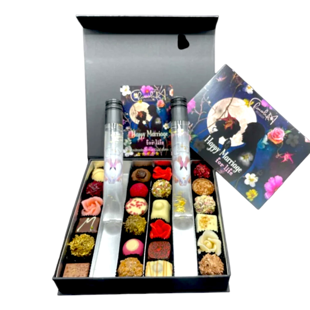 
                  
                    Originele assortiment-box van overheerlijke Chocolades & Bruidstranen met bladgoud.
                  
                
